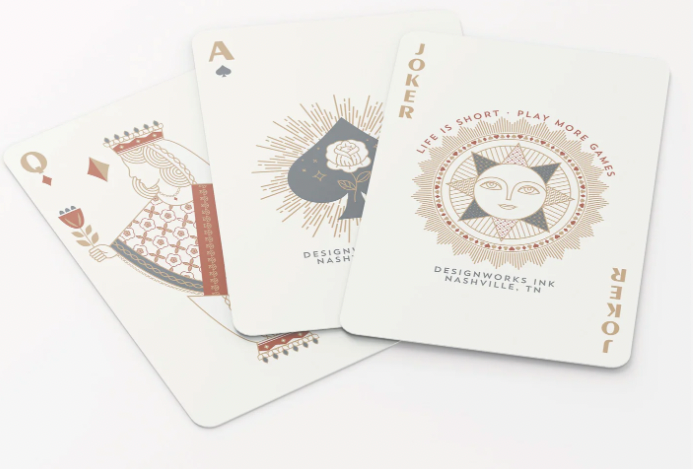 Celestial Playing Cards showing desings for Joke, Ace of Spades, and Queen
