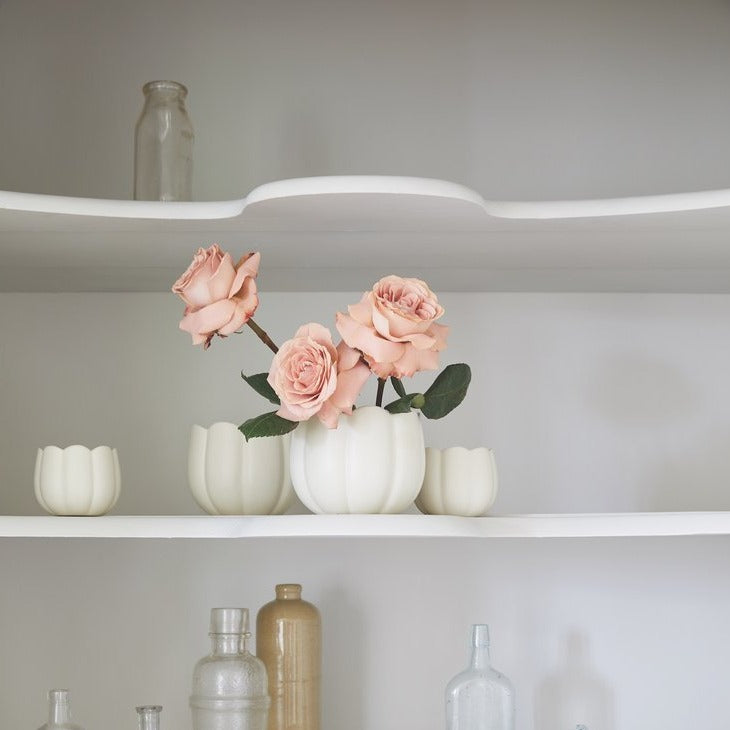 Flower Frog Vase on Shelf with pink roses displayed