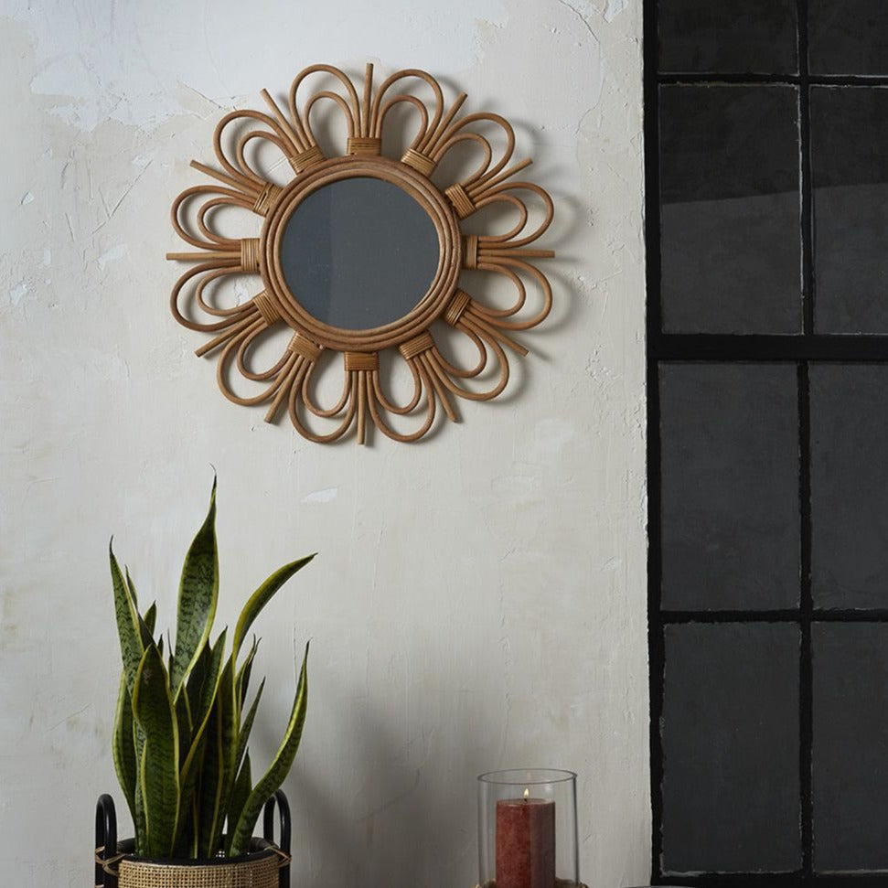 Sante Bamboo Mirror on concrete wall with snake plant on floor
