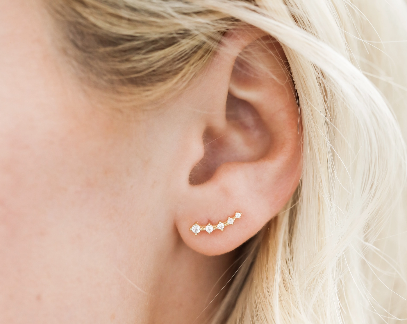 White Crawler Earrings on Woman