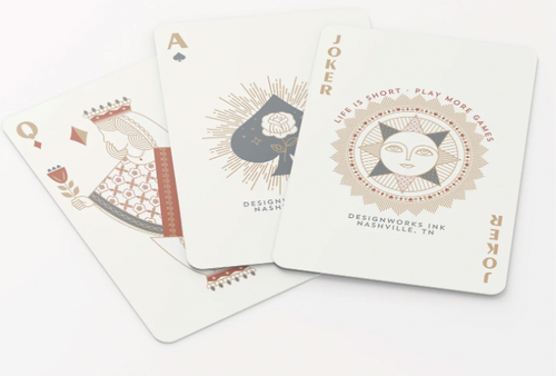 Celestial Playing Cards showing desings for Joke, Ace of Spades, and Queen