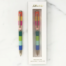 Load image into Gallery viewer, Idlewild Co. Rainbow Vertical Striped Pen showcased boxed and unboxed 
