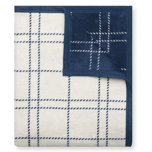Open Weave Plaid Blanket Folded in Cream and Blue 