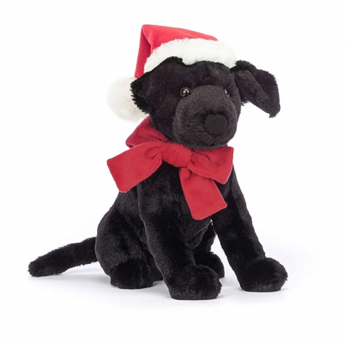 Black Labrador with santa hat and red bow around neck