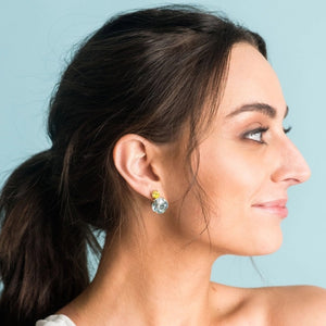 Aurora Crystal Drop Earring shown on brunette woman