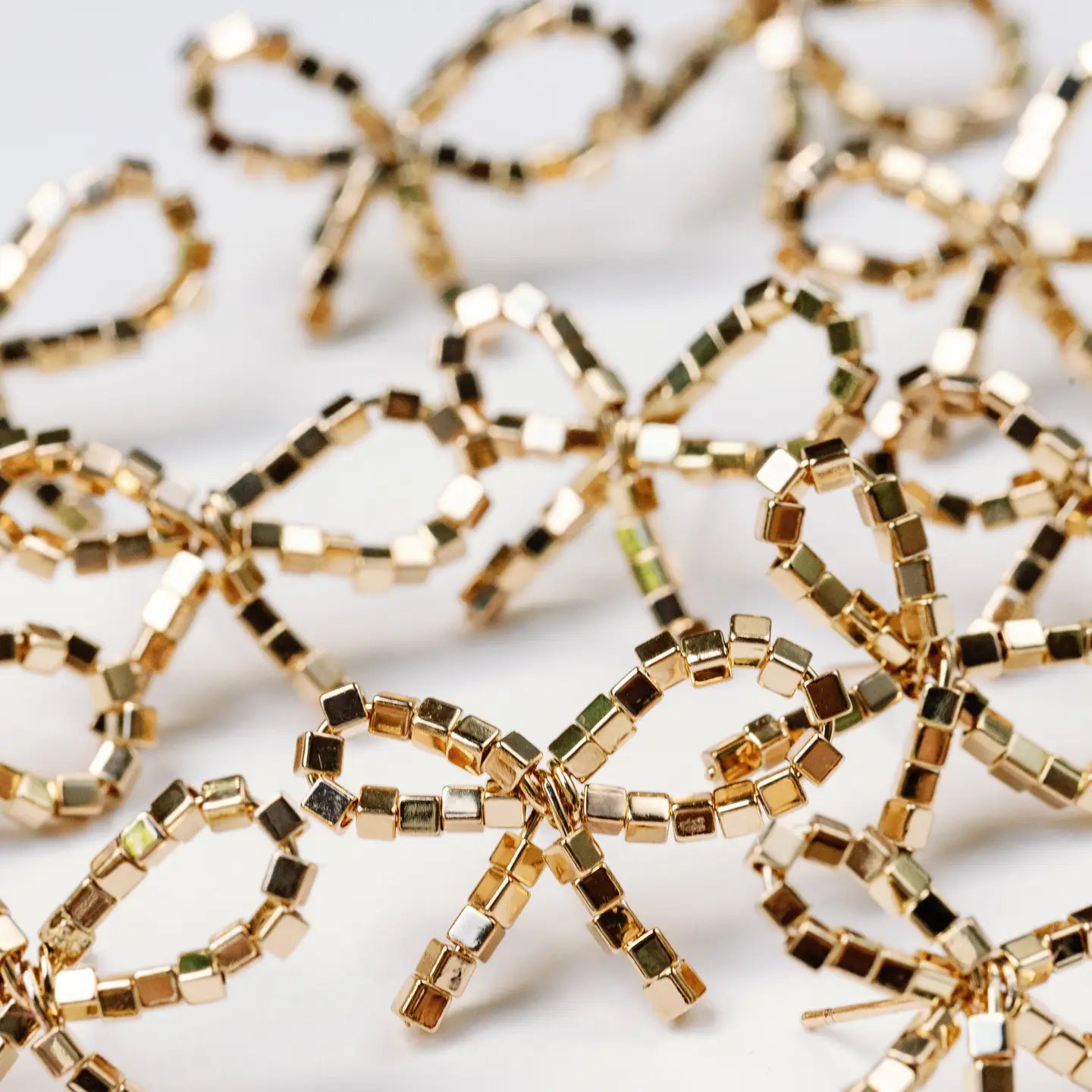 Mini Gold Beaded Statement Bow Earrings