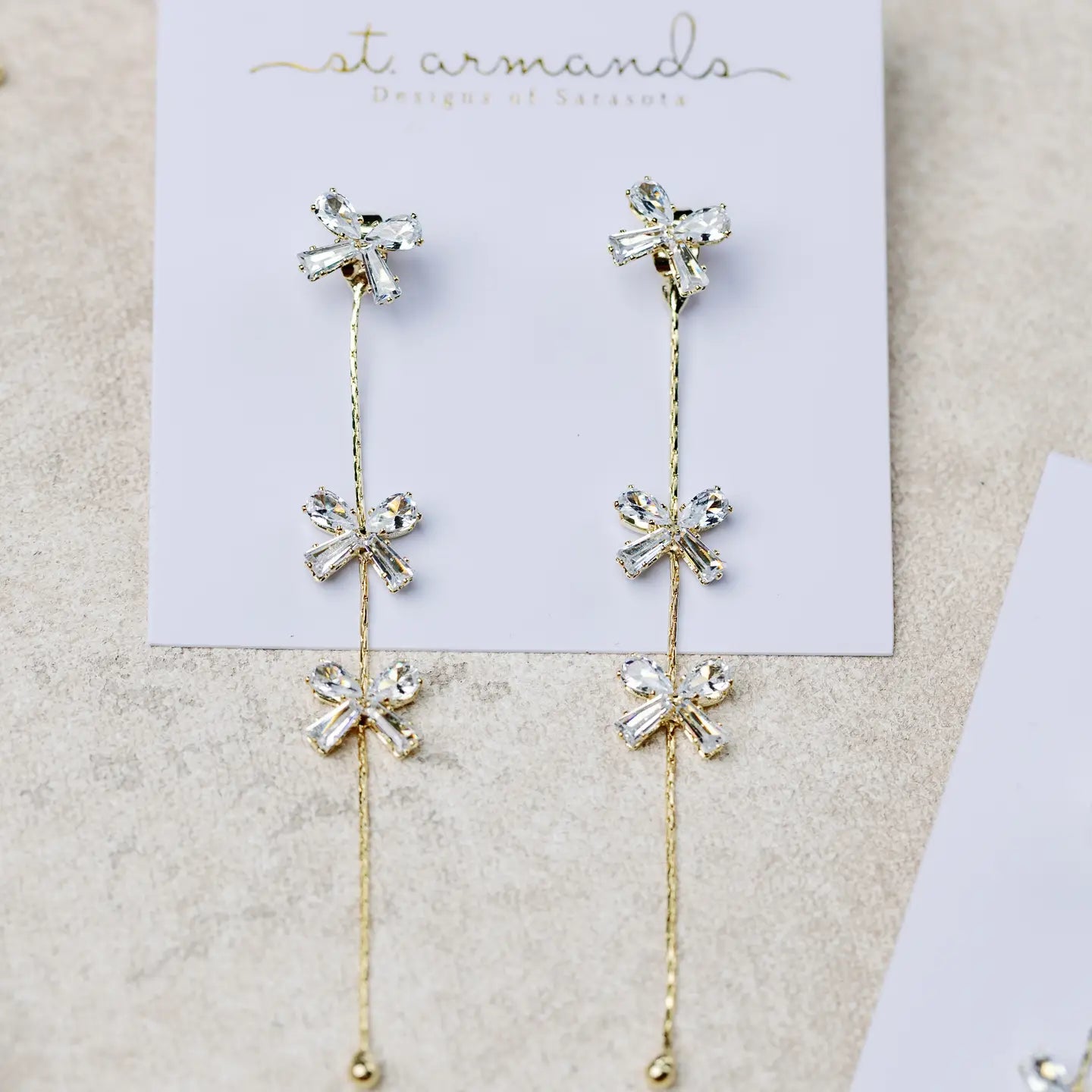 Diamond Bow Gold Drop Earrings