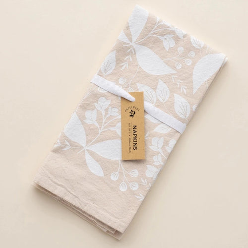 tan napkin with white berry print