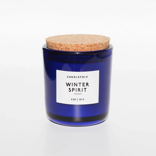glass candle, cork top. winter spirit scent