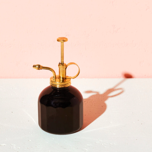 black glass mister with brass top