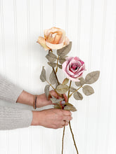 Load image into Gallery viewer, 2 Faux Dried Roses in Golden + Rose Color in Woman&#39;s Hand
