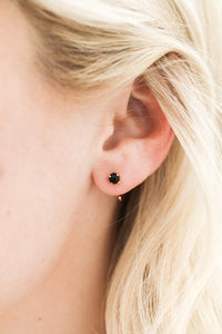 Huggie Earrings in ear