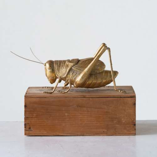 Golden Cricket Figurine on Wood Box