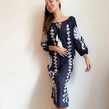 Load image into Gallery viewer, woman wearing navy blue and white embroidered tunic dress

