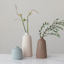 Load image into Gallery viewer, 3 sizes of various neutral vases with sprigs of greens
