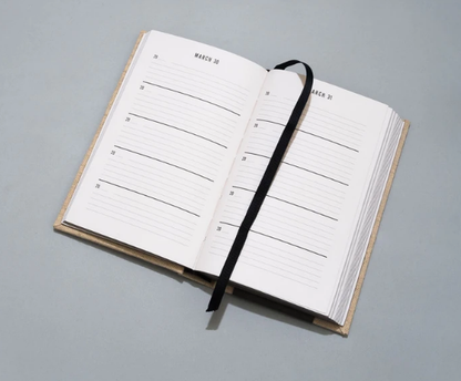 This One Line a Day Memory book features a rich oatmeal-colored, canvas cloth case; striking metallic page edges; and a ribbon page marker.