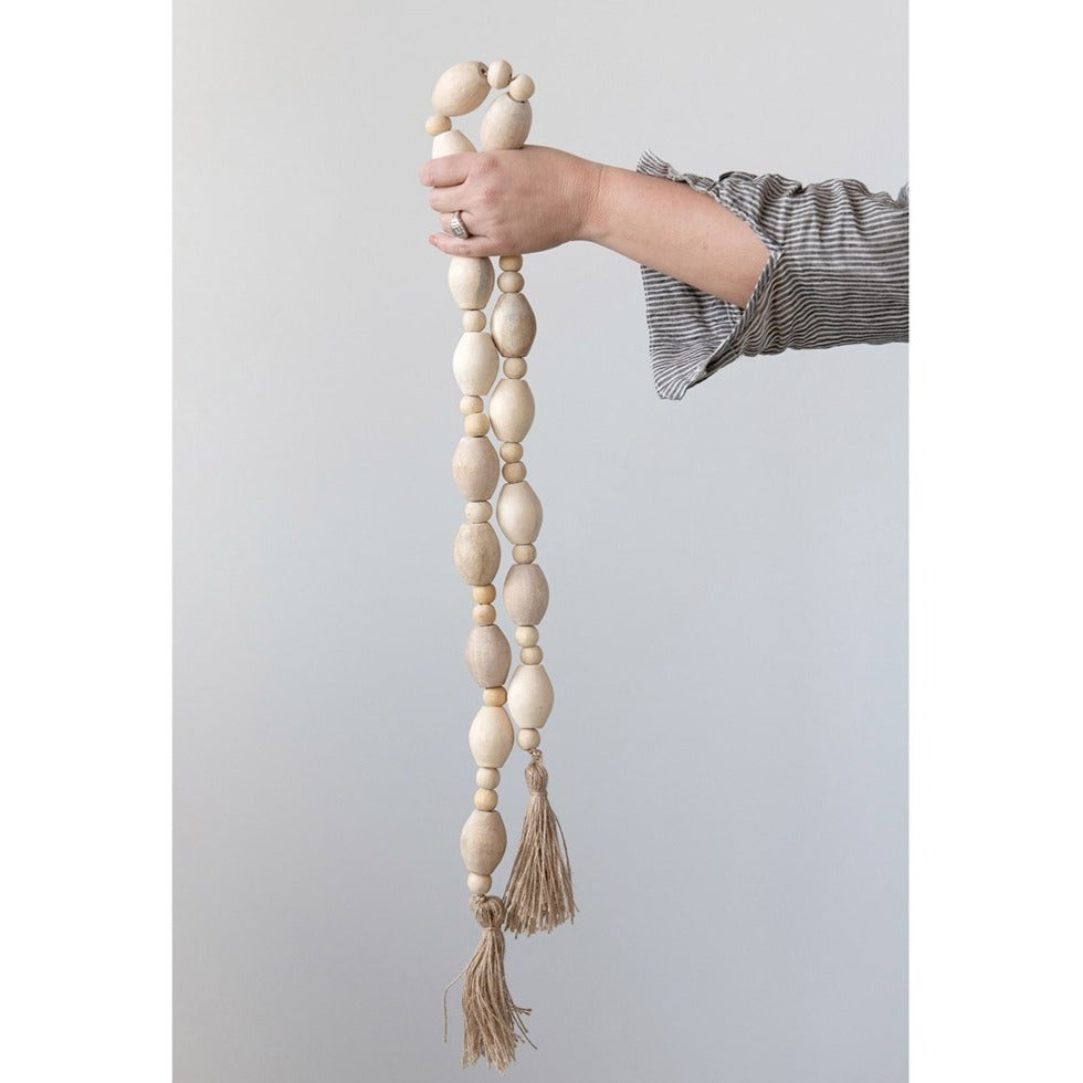These beautiful, Oval Mango Wood Beads make up this fun Garland, finished with Jute Tassels