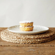Load image into Gallery viewer, Jute Woven Placemat with white plate and cupcakes
