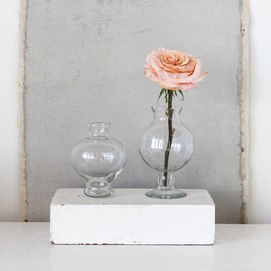 Olivia Footed Glass Vase next to taller version with rose stem