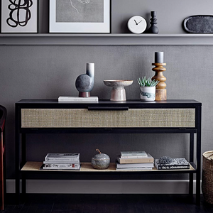 Stoneware Footed Bowl in modern, neutral home on top of a black console table