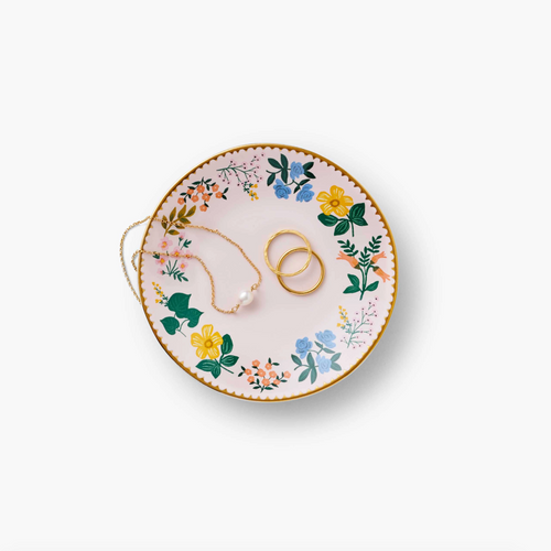 Rifle Paper Co Wildwood Ring Dish shown with gold rings and pearl necklace