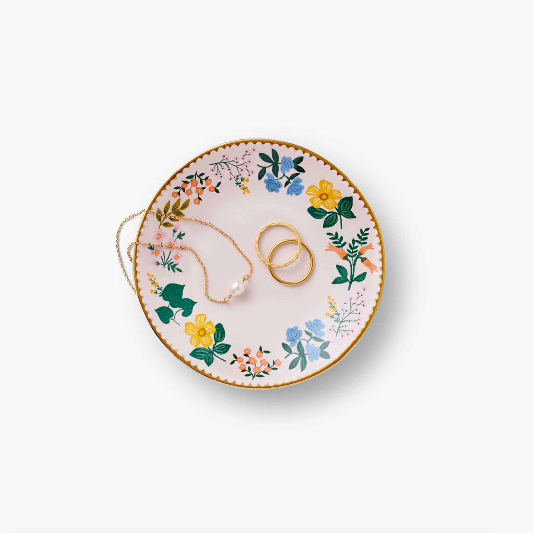 Rifle Paper Co Wildwood Ring Dish shown with gold rings and pearl necklace
